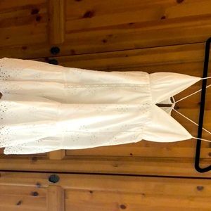 This dress from Zara was never worn. Great summer dress! White cotton